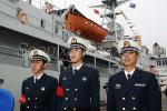 ID 6441 PLAN ZHENGHE - a training ship of the Peoples Liberation Army Navy alongside at Queens Wharf at the start of a five day stop-over in Auckland, New Zealand. Three officers form a guard at the gangway.